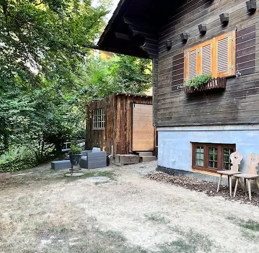 In On Edge Of Woods With River Chalé